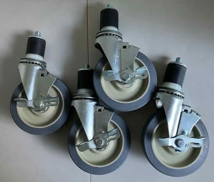 Photo of free Set of four 5” casters w/brakes (NE side of Lombard) #1