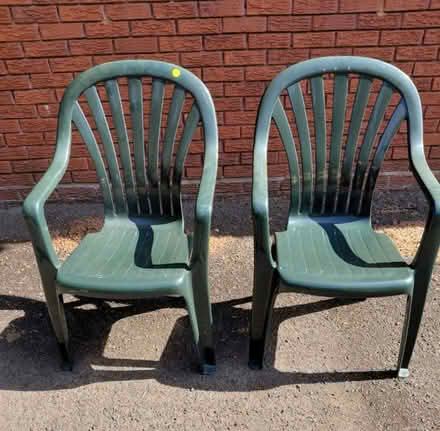 Photo of free 2 green plastic garden chairs (Golborne WA3) #1