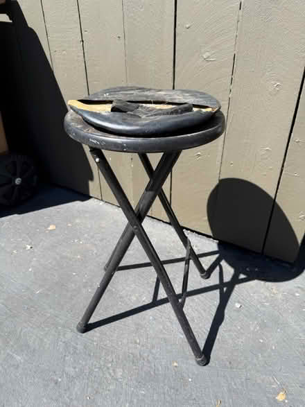Photo of free Black metal folding stool (1089 West Olive Avenue) #1