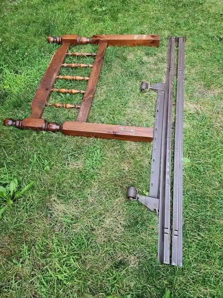 Photo of free Single bed frame and wood headboard (Junction) #1