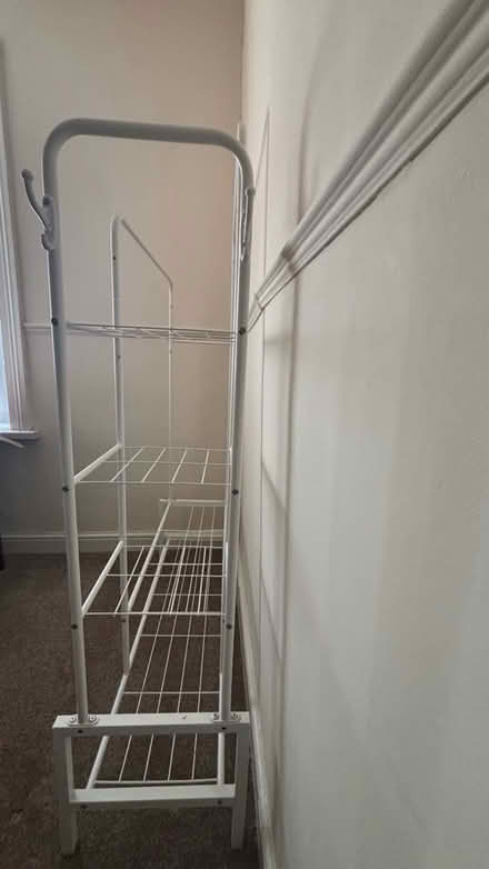 Photo of free Tall clothing rack and shoes store (Wyke BD12) #1
