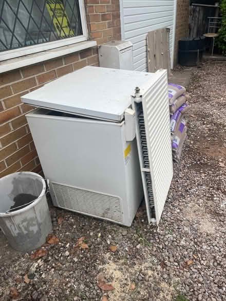 Photo of free Garage door, lockable freezer (not working) and radiator (The Moss CW3) #2