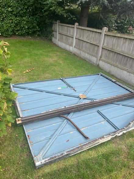 Photo of free Garage door, lockable freezer (not working) and radiator (The Moss CW3) #1