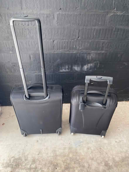 Photo of free 2 small black suitcases on wheels (Penyffordd CH4) #2