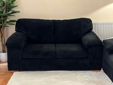 Photo of free Black jumbo cord 2 seater sofa (Finsbury Park N7) #1