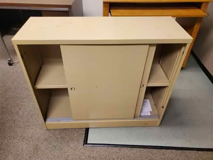 Photo of free metal bookshelf cabinet with doors (South Bellevue) #1