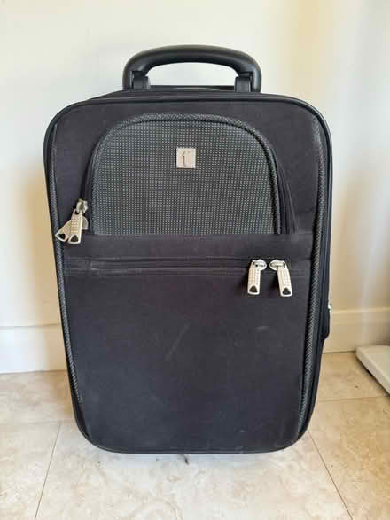 Photo of free Small black suitcase (Wokingham RG40) #1