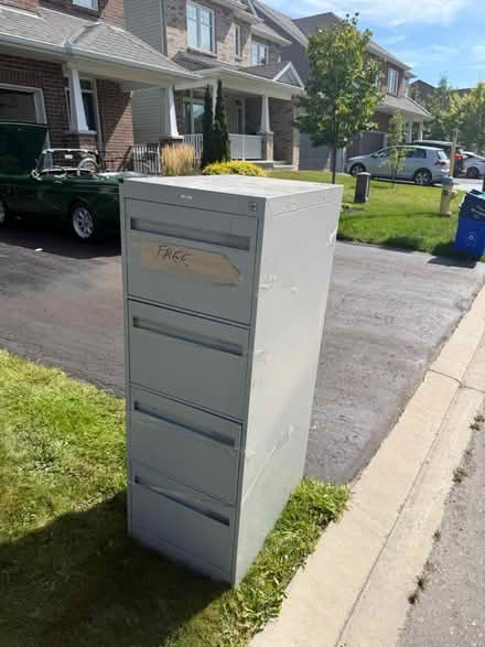 Photo of free Filing Cabinet for storage (Orleans. Trim and St Joseph) #3