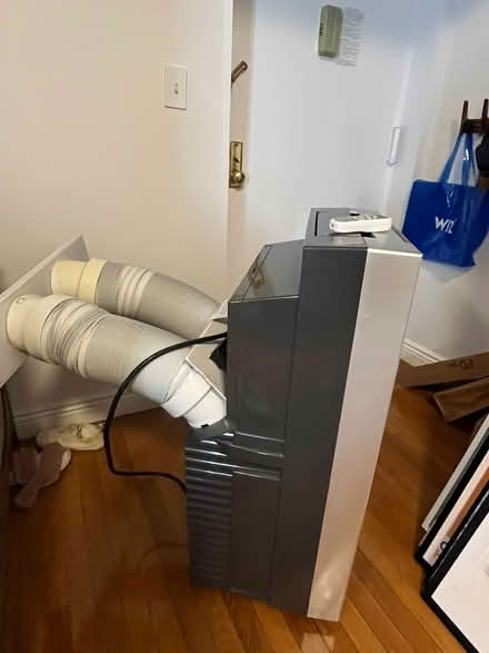 Photo of free Portable AC with a remote (upper west side) #2