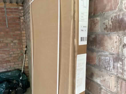 Photo of free Shower end panel still in cardboard from Wickes (Wilmslow SK9) #1