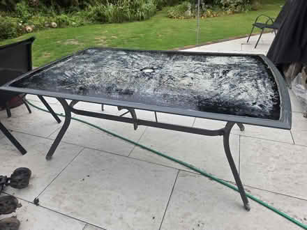 Photo of free Large metal and glass garden table (Frimley) #1
