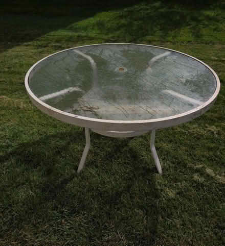 Photo of free CURB ALERT: Glass-Top Patio Table (Geddes Way, Pipersville) #1