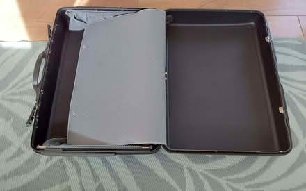 Photo of free Samsonite black suitcase (Bare LA4) #4