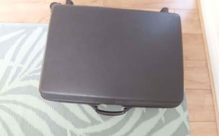 Photo of free Samsonite black suitcase (Bare LA4) #2