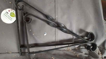 Photo of free 2 brackets for hanging baskets (Byfleet KT14) #1