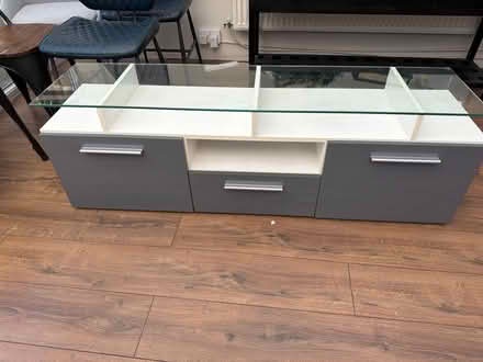 Photo of free Glass top tv stand (Knotty ash) #1