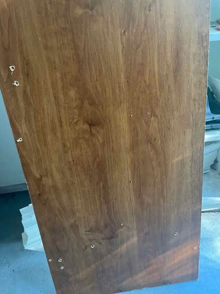 Photo of free 2 particle board wooden shelves (Vero beach fl) #4