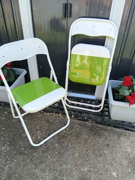Photo of free 2 green padded fold up chairs (Belvidere SY2) #1
