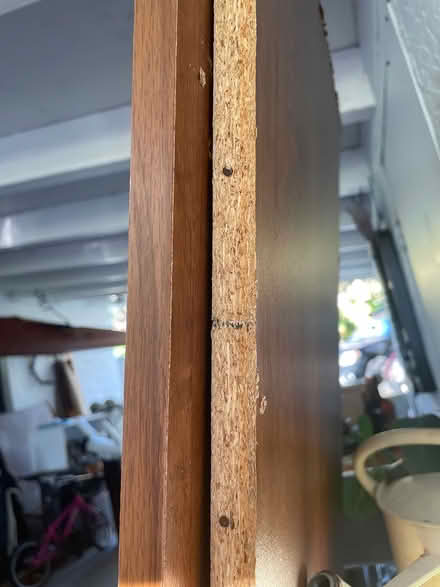 Photo of free 2 particle board wooden shelves (Vero beach fl) #3