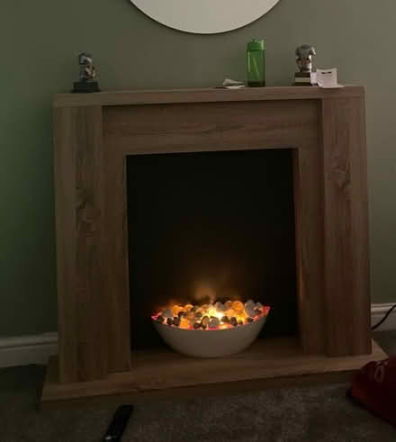 Photo of free Next light oak fire and surround (Swalwell NE16) #1