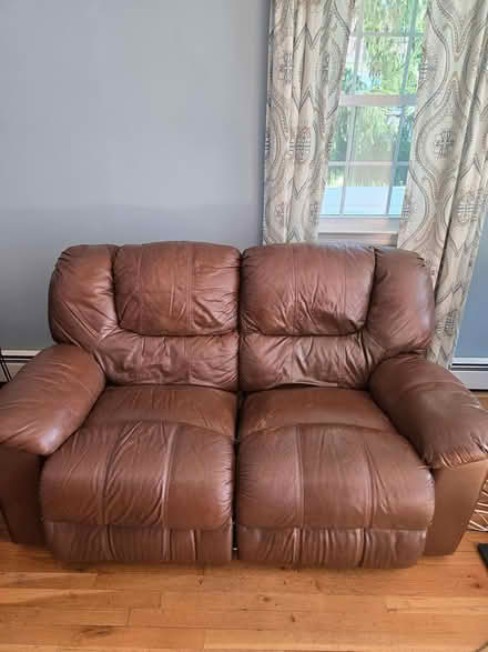Photo of free Leather reclining love seat (Bayville, ny) #1