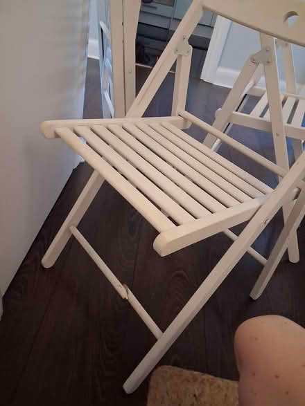 Photo of free Three IKEA fold up white chairs (Islington N1) #2