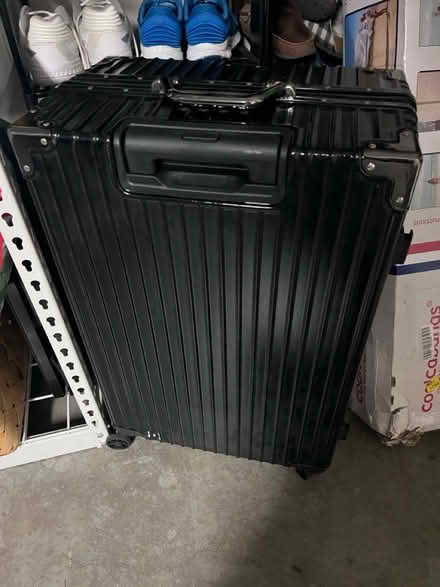 Photo of free 28” hard side suitcase (near kings academy) #1