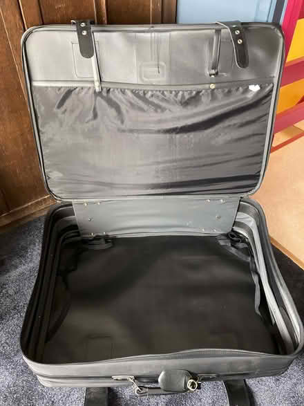Photo of free Black wheeled suitcase (Wanstead IG4) #1