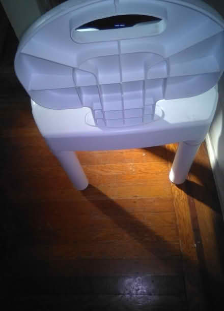 Photo of free White shower chair (60th cedar ave 19143) #2