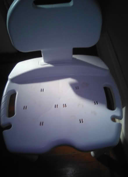Photo of free White shower chair (60th cedar ave 19143) #1