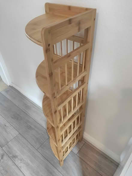 Photo of free Wooden corner shelving unit (E10 6RH) #1