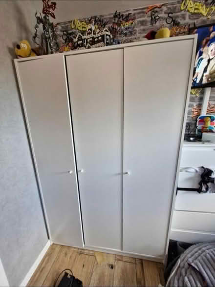 Photo of free 3 door ikea wardrobe (MK15 downhead park) #1
