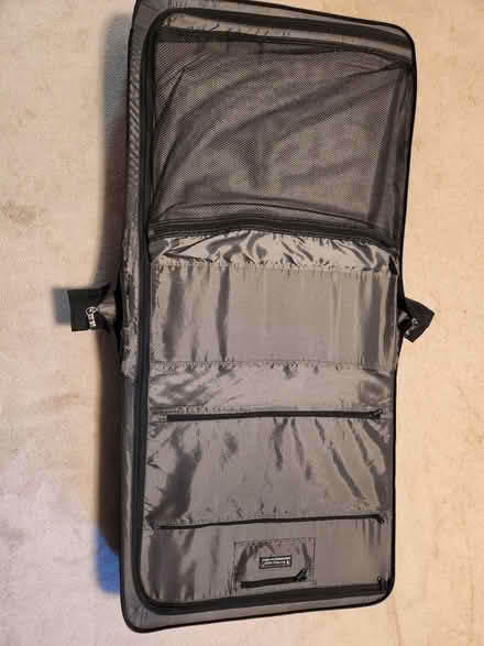 Photo of free Suitcase (repairs (Gloucester) #2