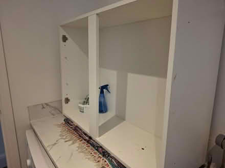 Photo of free Wren kitchen cupboard with blue doors and glass shelves. (Glen Parva LE2) #1
