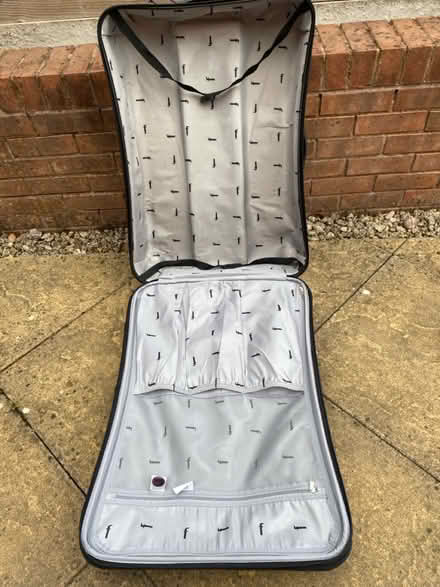 Photo of free Large hard shell suitcase (B31) #2