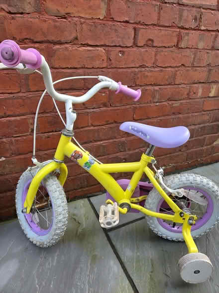 Photo of free Yellow bike with stabilisers 12 inch (New Longton PR4) #1