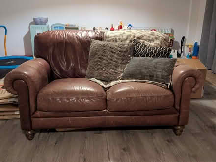 Photo of free 2 seater brown leather sofa (Wandsworth SW18) #1