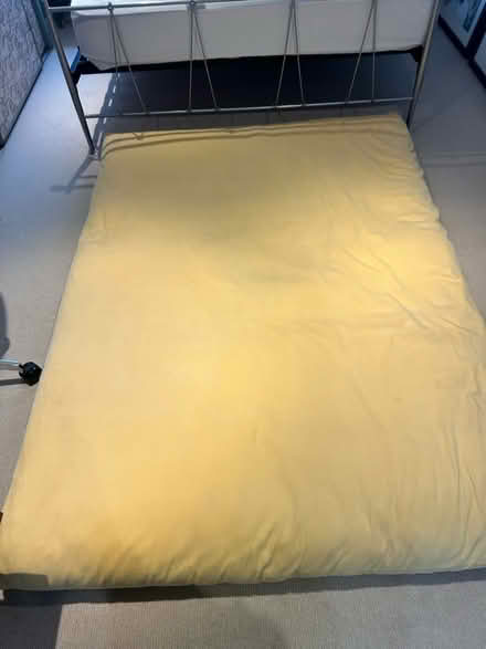Photo of free Double futon mattress with zip cover (Barnes SW13) #1