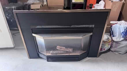 Photo of free Napoleon gas log fireplace insert (Highlands Ranch) #1