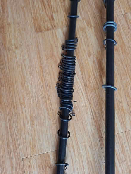Photo of free 2 black metal curtain poles. (Chalford Hill GL6) #3