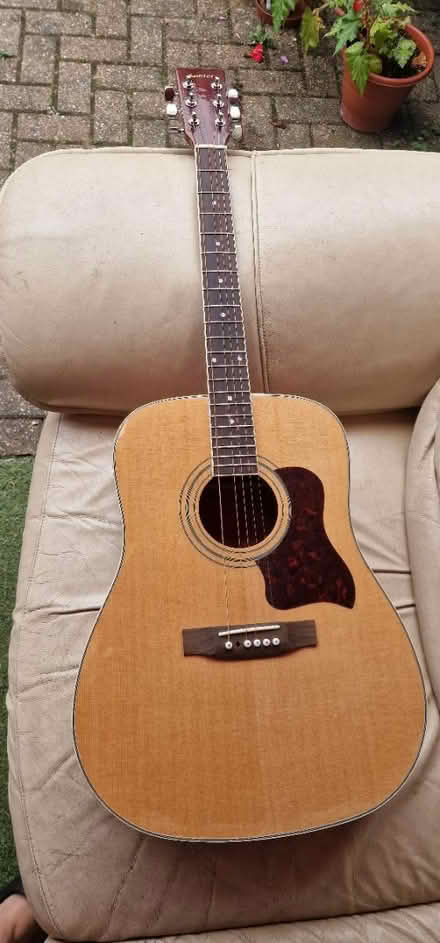 Photo of free Acoustic guitar (Addlestone KT15) #1