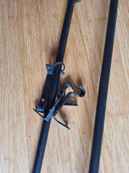 Photo of free 2 black metal curtain poles. (Chalford Hill GL6) #4