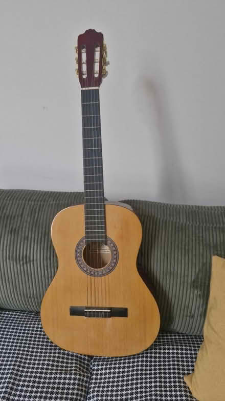 Photo of free Acoustic guitar (Surbiton KT5) #1