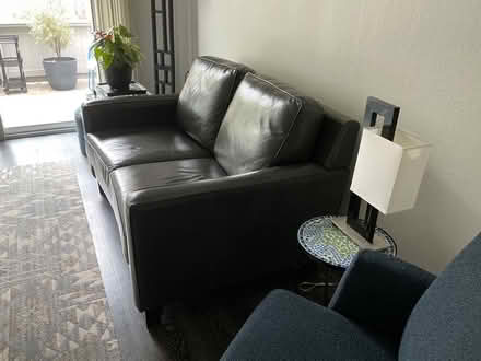 Photo of free Leather loveseat (Capitola, 44th & Capitola Rd.) #1