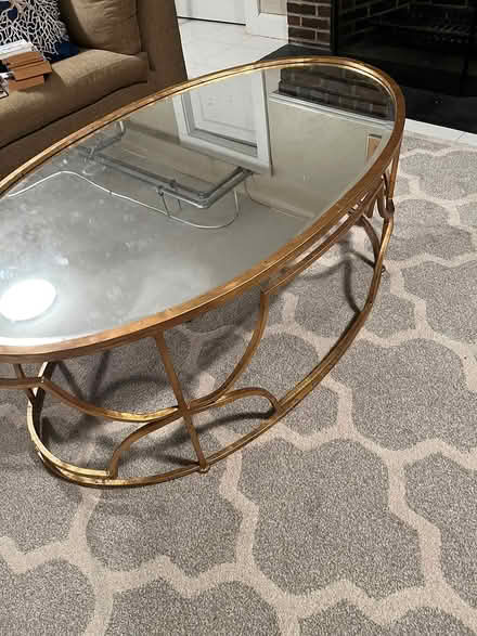 Photo of free Mirrored oval coffee table (Cushing Square) #1