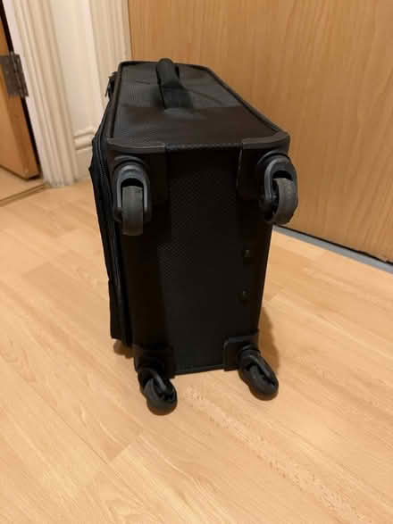 Photo of free Carry on luggage - corner ripped (N7) #2