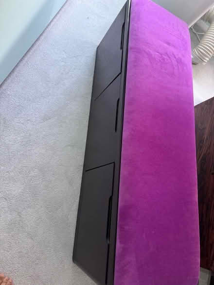 Photo of free Ottoman - black wood with purple cushion (Putney SW15) #1