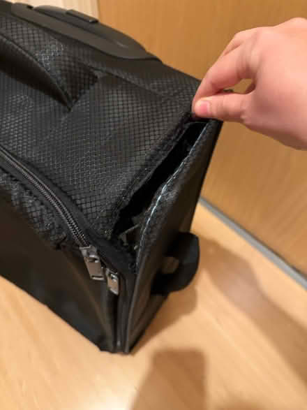 Photo of free Carry on luggage - corner ripped (N7) #3