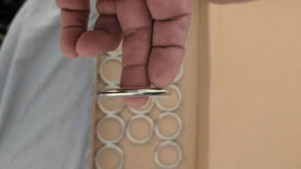 Photo of free 22 unused curtain rings (E6 5RN) #2
