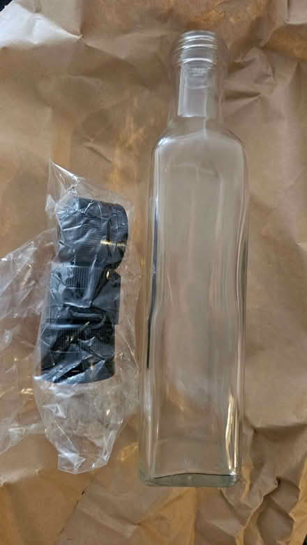 Photo of free new glass bottles with lids, (Stepney E1) #1